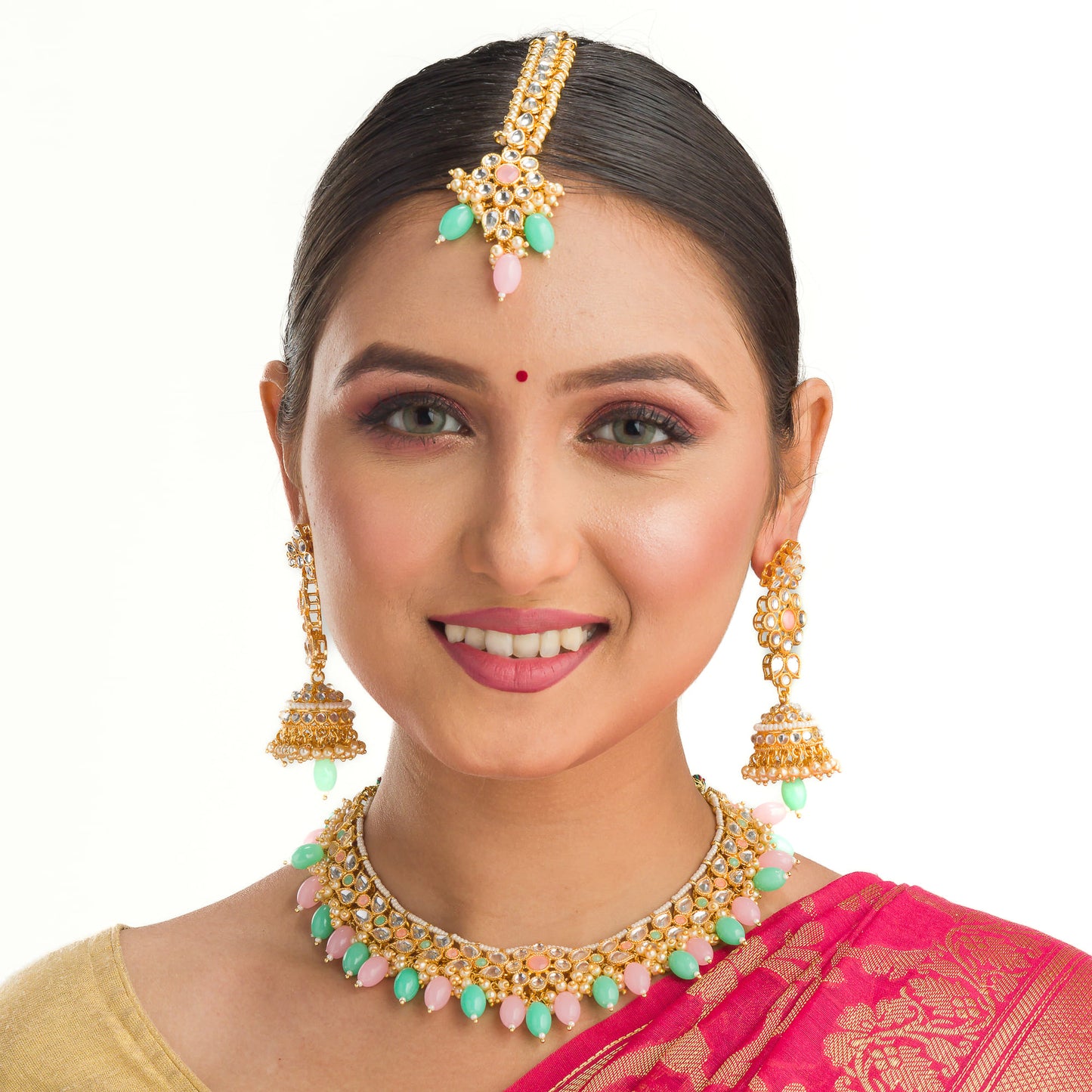 REGAL BRIDAL CHOKER SET FEATURING WITH GREEN AND PINK KUNDAN FOR A STUNNING AND TRADITIONAL TOUCH.