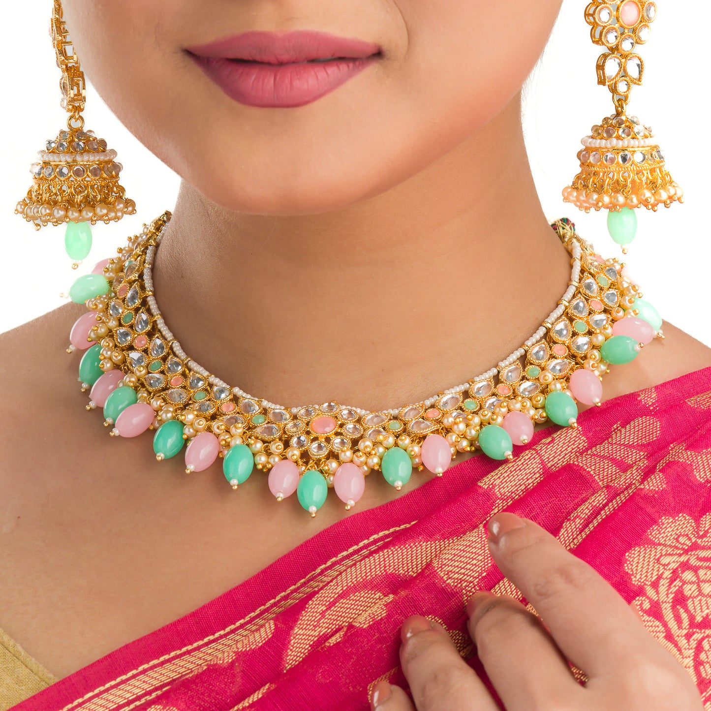 REGAL BRIDAL CHOKER SET FEATURING WITH GREEN AND PINK KUNDAN FOR A STUNNING AND TRADITIONAL TOUCH.