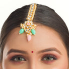 Elegant bridal choker set with green and pink Kundan, adding a traditional, regal touch
