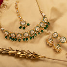 Regal green Kundan bridal choker set for a stunning and traditional bridal look
