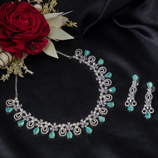 A LIGHT GREEN ZIRCON STONE NECKLACE SET OFFERS A REFRESHING, ELEGANT TOUCH WITH ITS SUBTLE, SPARKLING HUE.