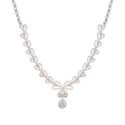 Trendy leaf-shaped silver necklace with white drops for a chic, modern style
