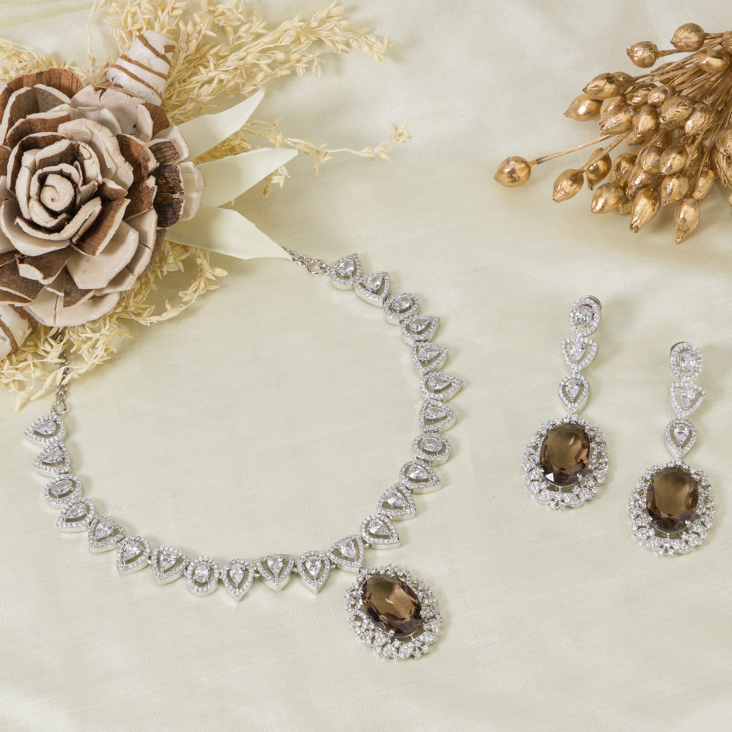 A ZIRCON NECKLACE WITH BROWN COLORED ZIRCON STONES COMBINES DAZZLING SPARKLE WITH A SERENE, REFRESHING HUE.