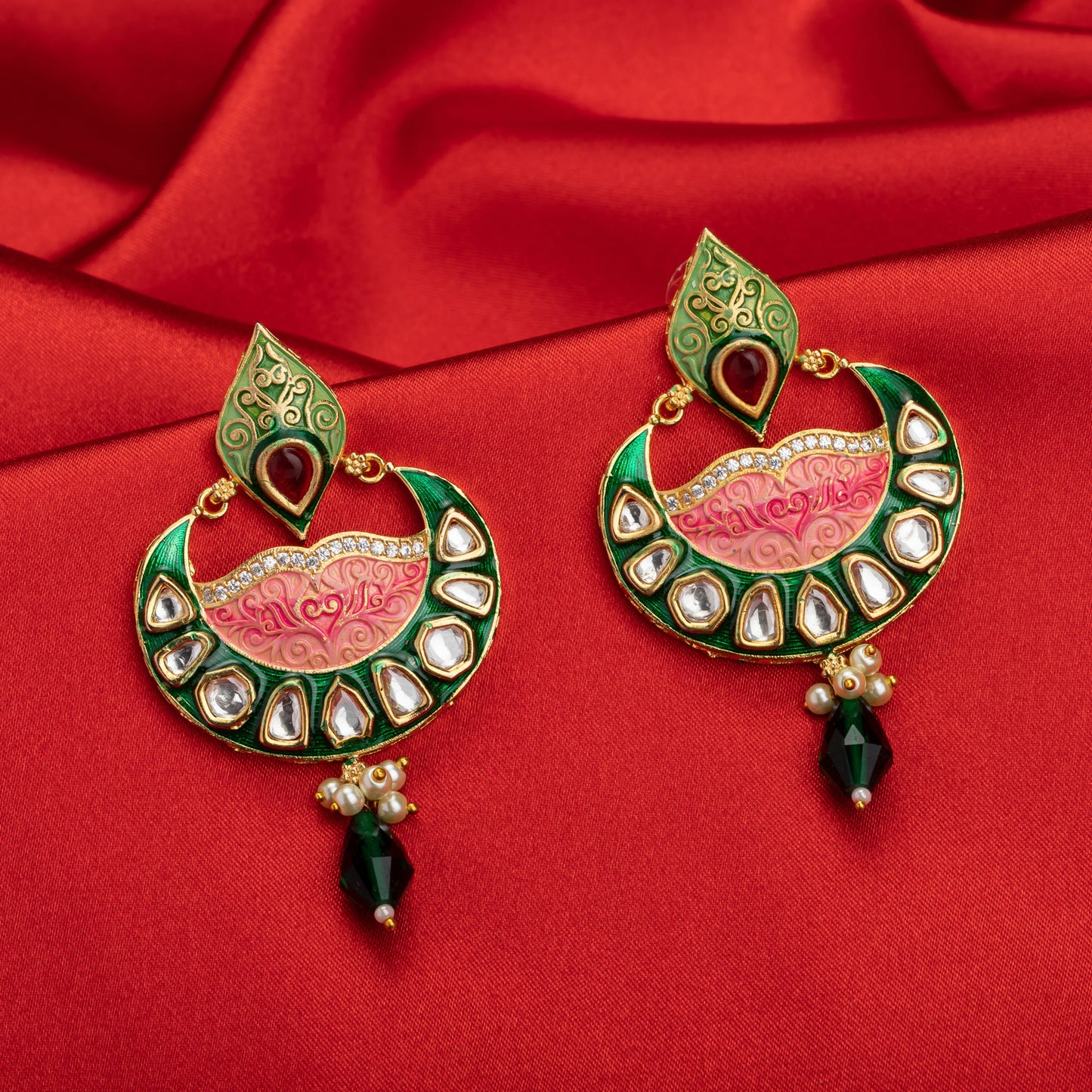 EARRINGS WITH GREEN AND PINK MEENAKARI DESIGN FEATURE VIBRANT ENAMEL WORK THAT ADDS A COLORFUL AND TRADITIONAL TOUCH.