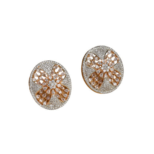 Gold-tone zircon round stud earrings add elegant sparkle for a sophisticated look.
