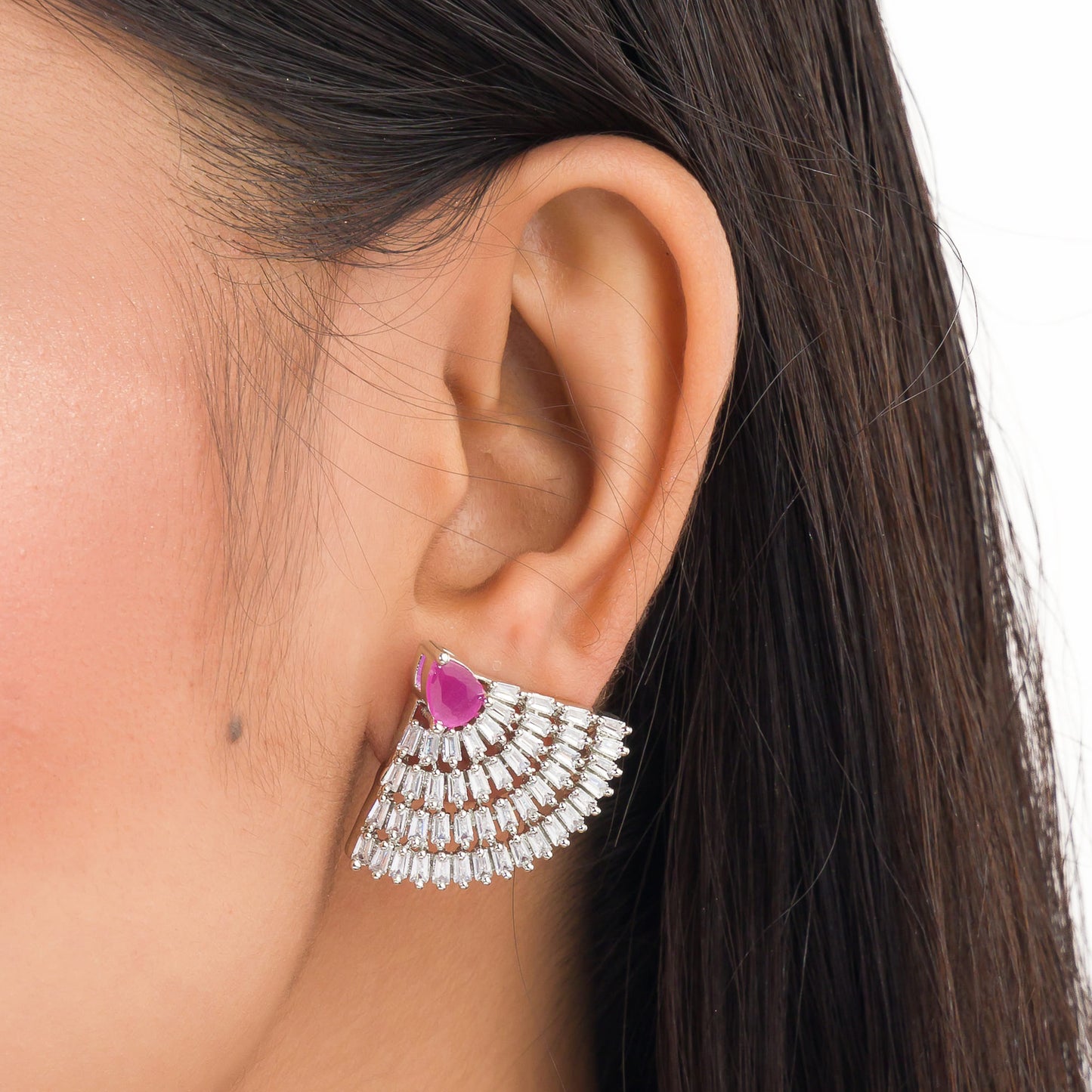 EARRING STUDS WITH PINK AND ZIRCON STONES OFFER A CHARMING COMBINATION OF VIBRANT COLOR AND SPARKLING ELEGANCE.