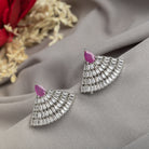 Pink zircon stud earrings offer vibrant color and sparkling elegance for any occasion.
