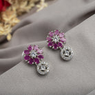 Trendy pink zircon flower studs add a vibrant, playful touch to your look.
