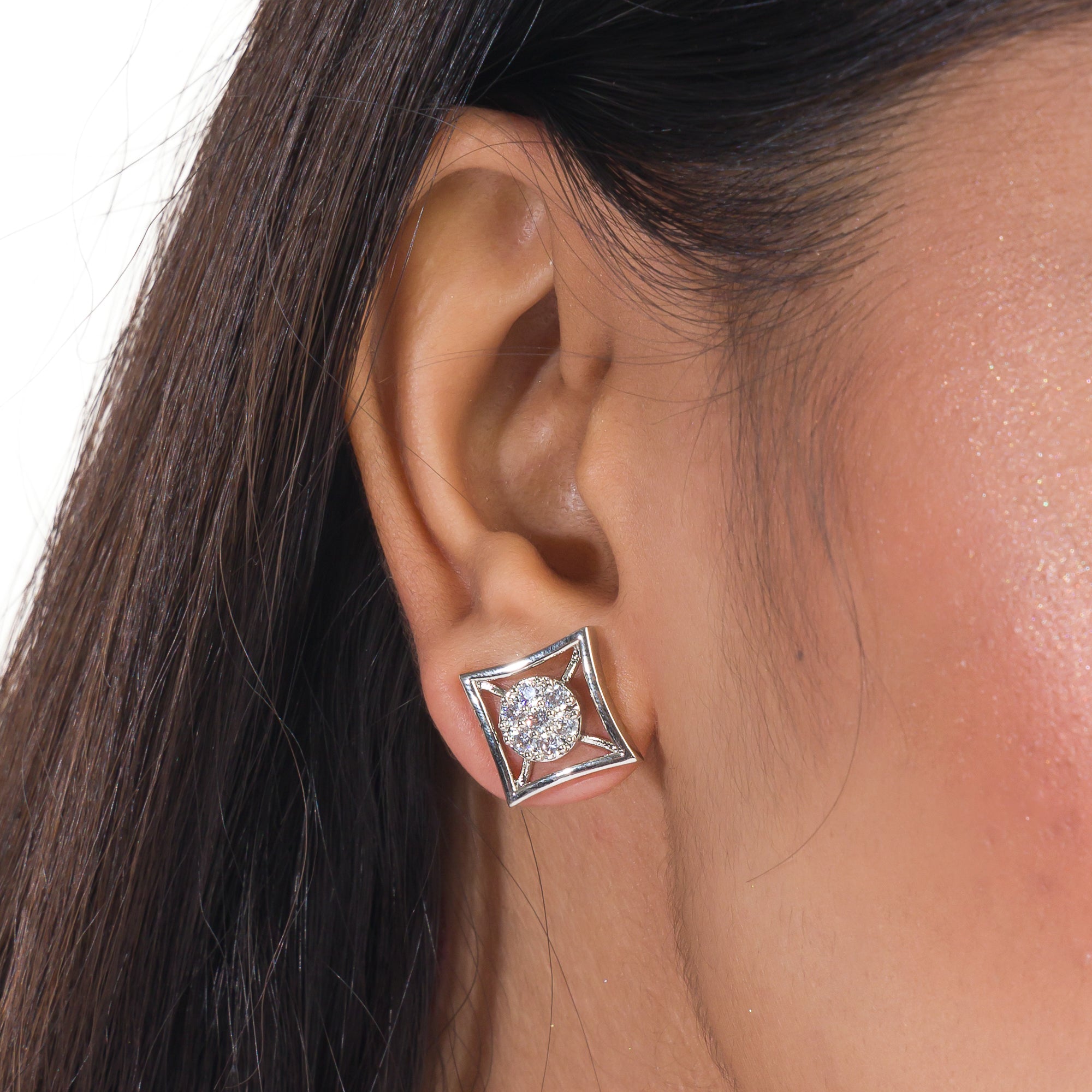 "Silver square zircon earrings bring modern sophistication and subtle sparkle for office wear."
