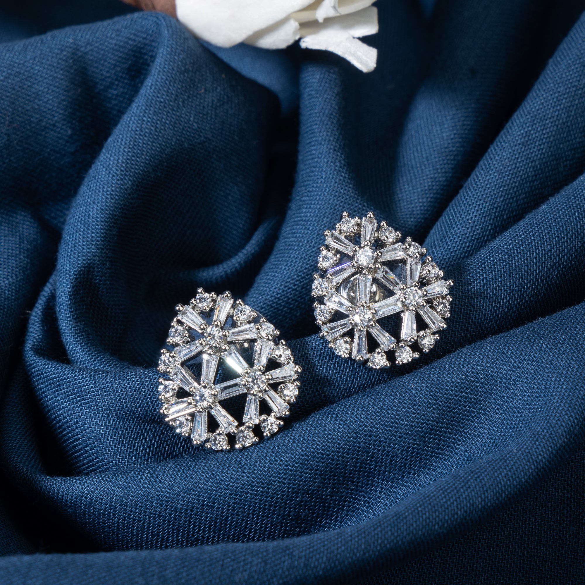 "Silver zircon studs add everyday elegance with subtle sparkle for casual wear."
