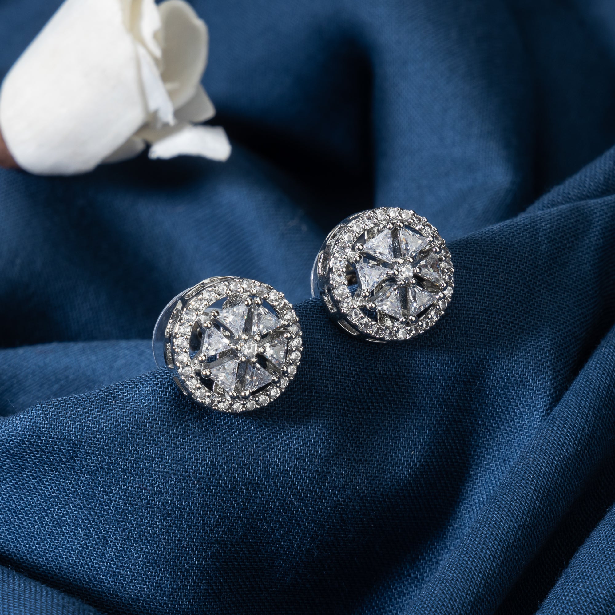 "Small triangular and round zircon earrings exude refined sophistication, perfect for office wear."
