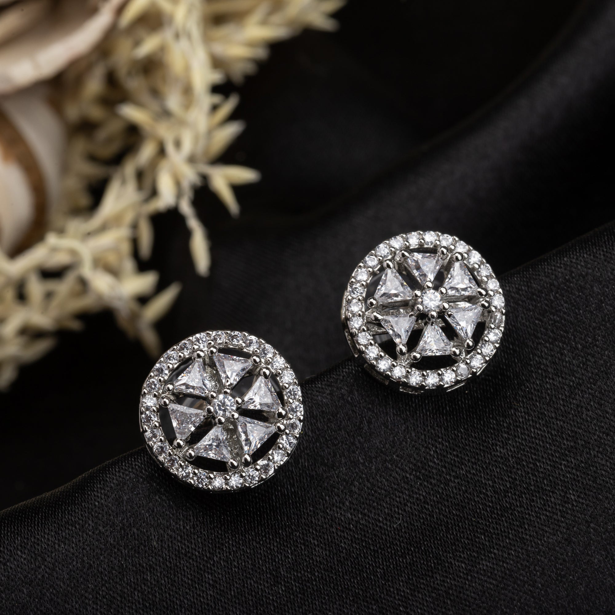 "Small triangular and round zircon earrings exude refined sophistication, perfect for office wear."
