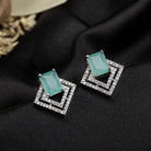 "Light green zircon studs sparkle with elegance, adding vibrant color to your casual look."
