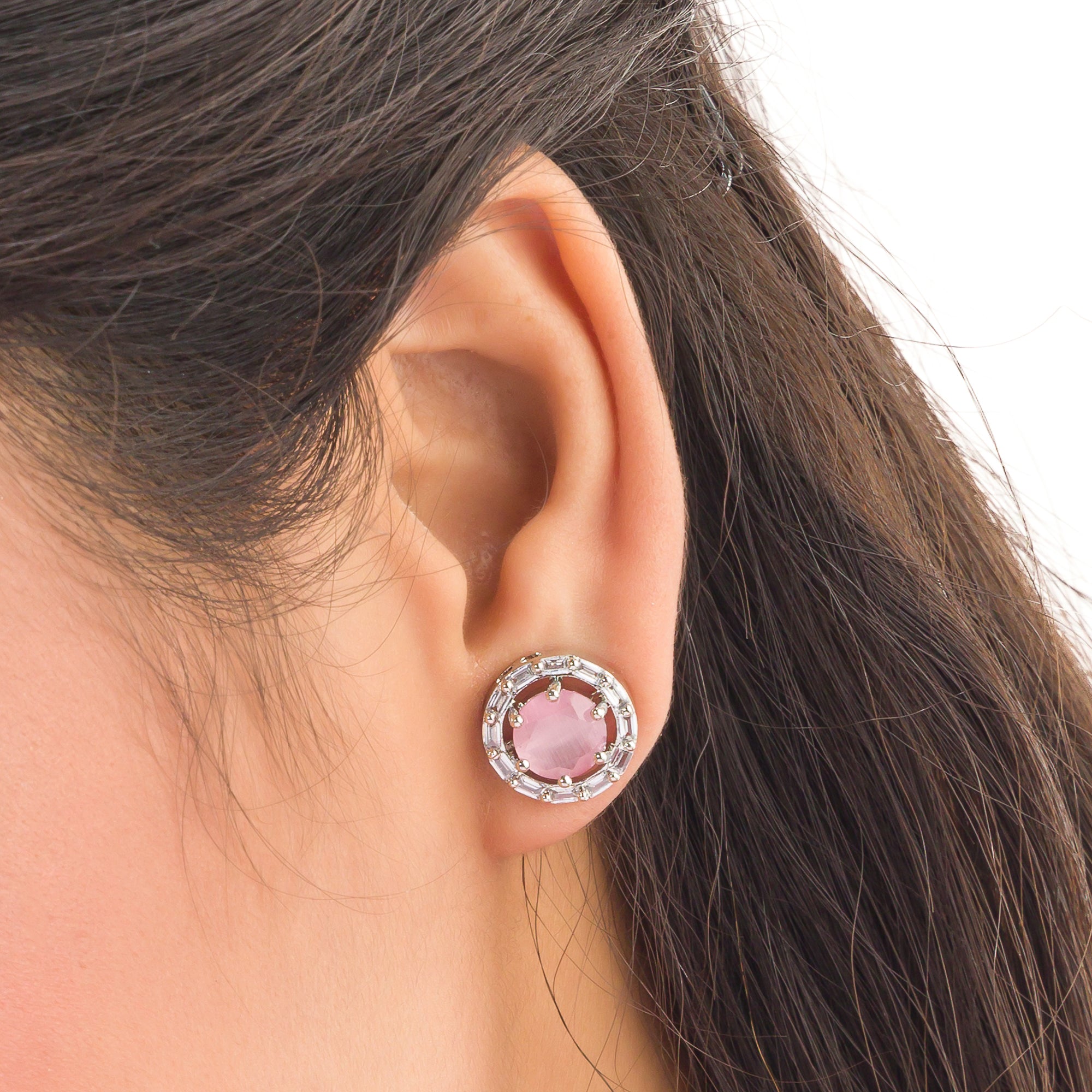 "Pink zircon stud earrings bring stunning sparkle and a vibrant, elegant touch to any look."
