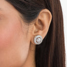  "Timeless zircon stud earrings offer brilliant sparkle and versatile elegance for any occasion."
