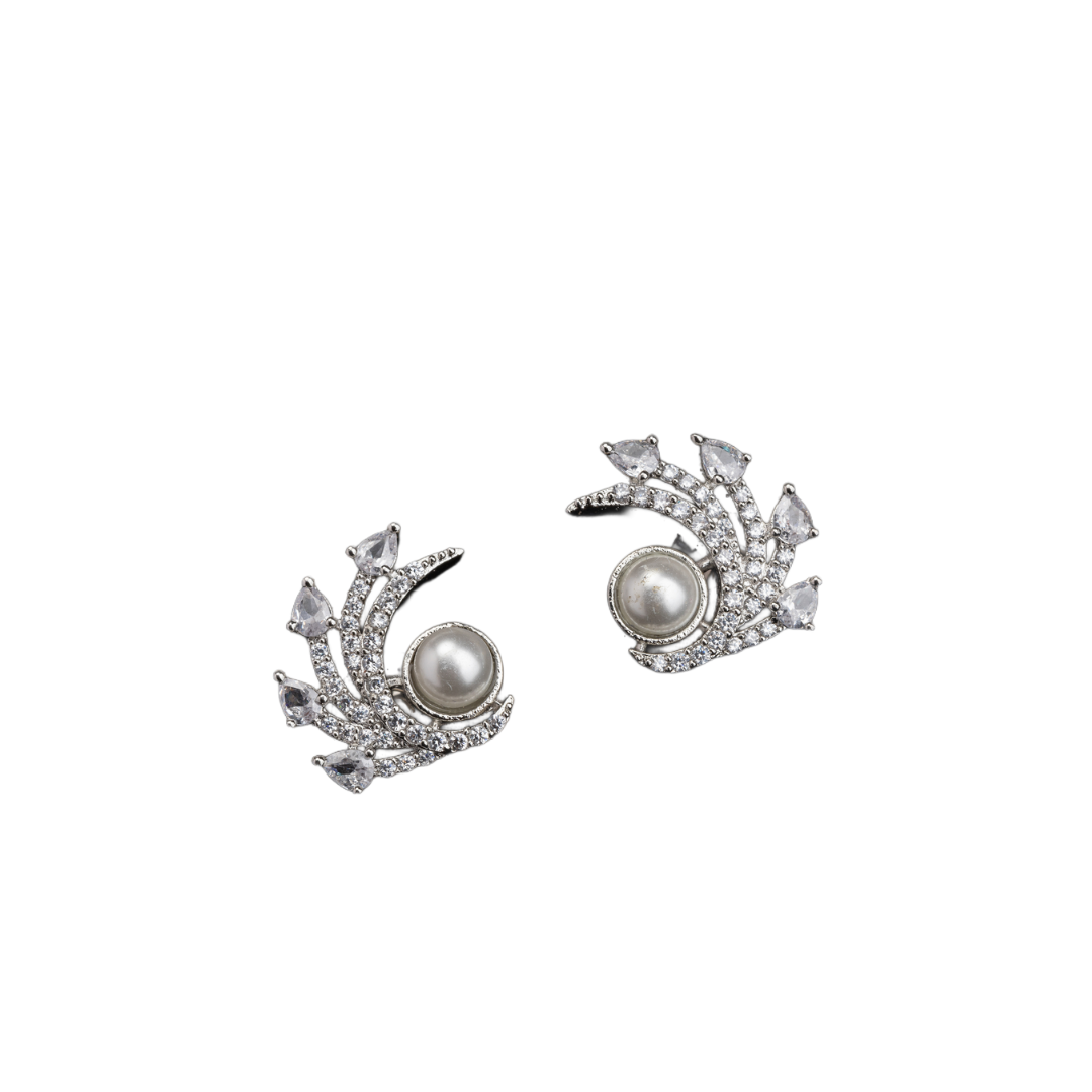 "Zircon studs with a single pearl offer sparkling brilliance and classic, sophisticated elegance."
