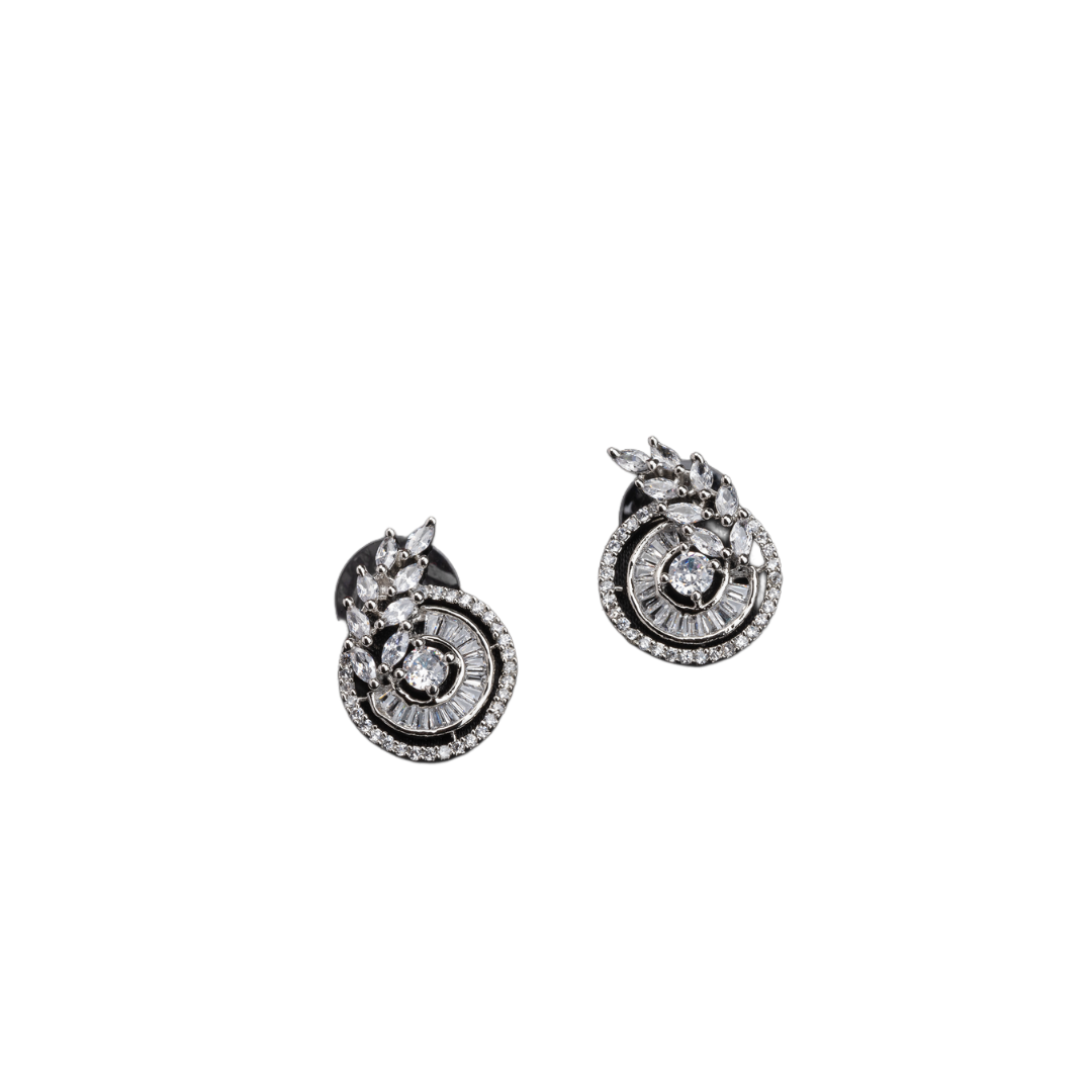  "Round and leaf zircon earrings combine sparkling beauty with nature-inspired, elegant charm."
