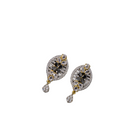  "Zircon earrings with a golden touch combine sparkling brilliance and a warm, luxurious finish."
