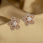 "Rose gold zircon earrings with sparkling brilliance for a sophisticated touch."
