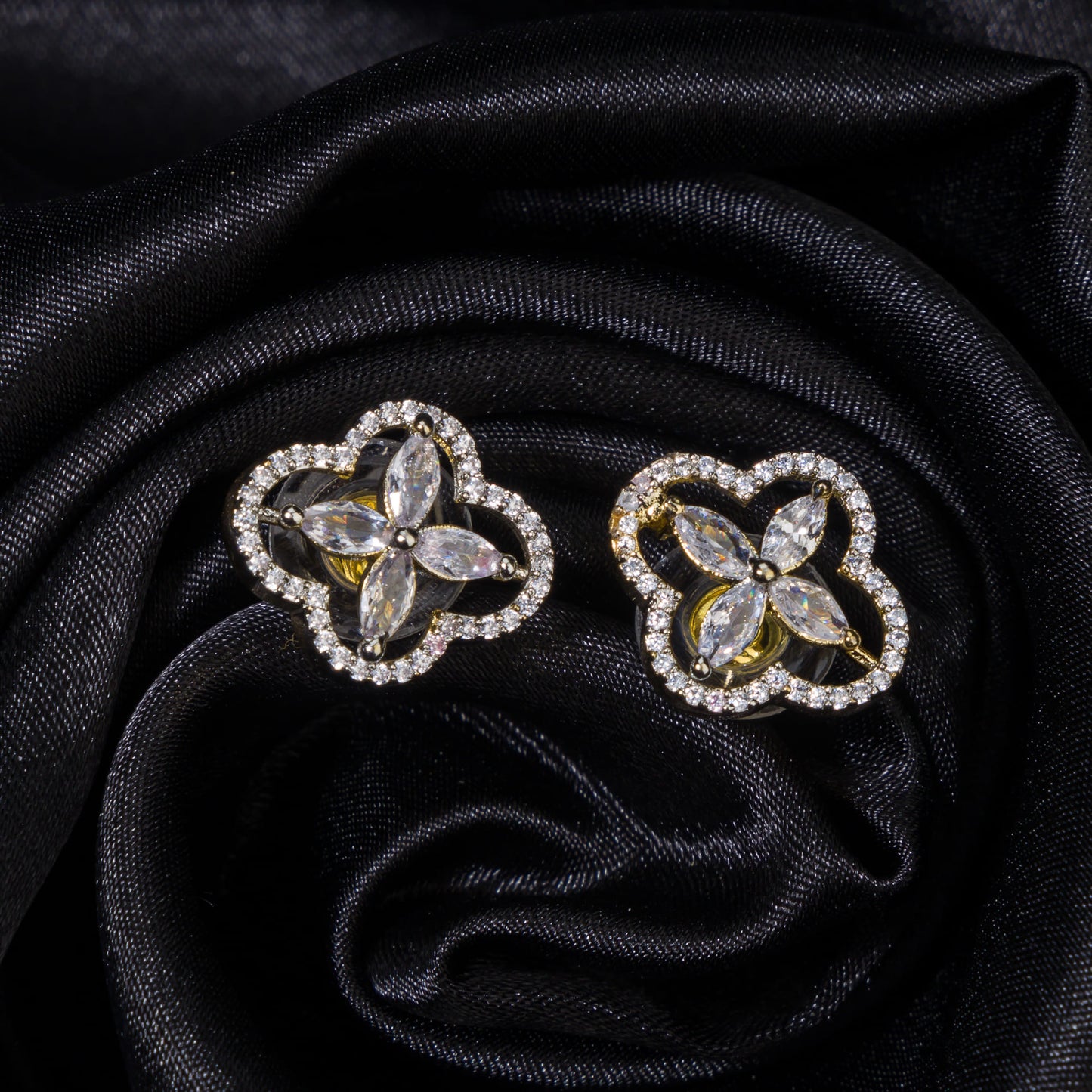 GOLD-PLATED ZIRCON EARRINGS BLEND DAZZLING SPARKLE WITH A WARM, LUXURIOUS FINISH.