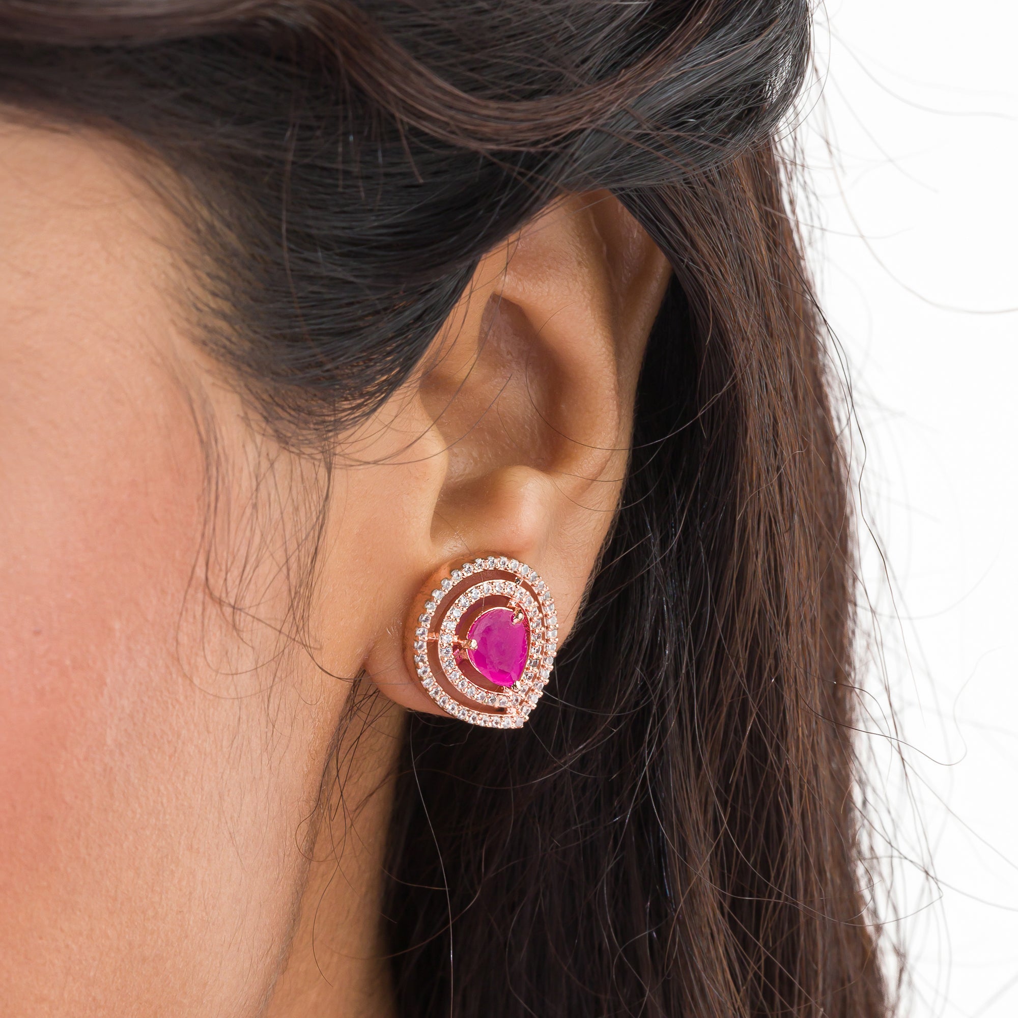 Pink zircon earrings offering vibrant elegance with a sparkling, romantic touch.
