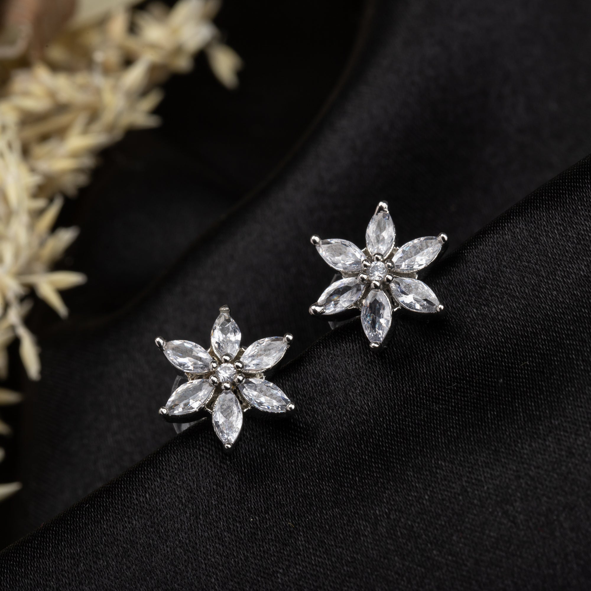 Silver starry zircon earrings for daily wear with a brilliant sparkling touch.
