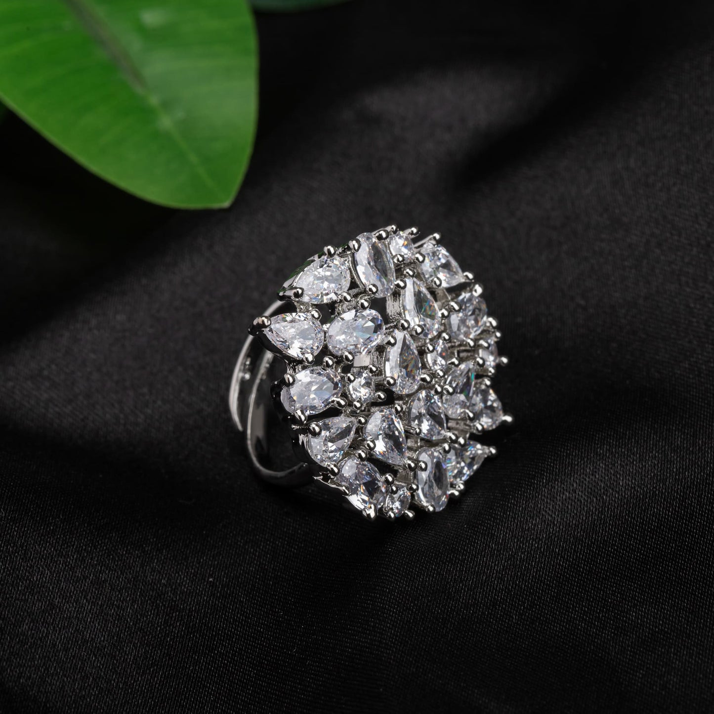 A ZIRCON FINGER RING ADDS A TOUCH OF ELEGANCE WITH ITS DAZZLING SPARKLE AND CLASSIC APPEAL.