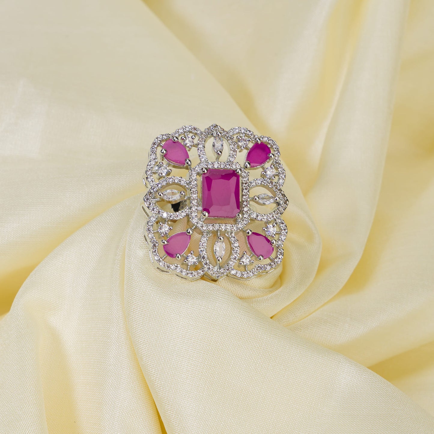 A PINK ZIRCON FINGER RING OFFERS A CHIC AND ELEGANT TOUCH WITH ITS VIBRANT, ROMANTIC HUE.