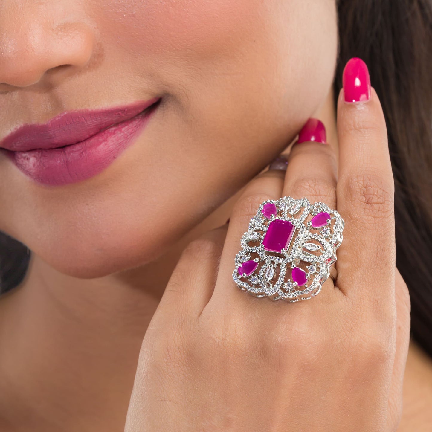 A PINK ZIRCON FINGER RING OFFERS A CHIC AND ELEGANT TOUCH WITH ITS VIBRANT, ROMANTIC HUE.