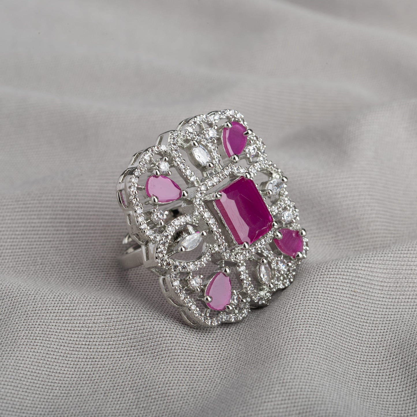 A PINK ZIRCON FINGER RING OFFERS A CHIC AND ELEGANT TOUCH WITH ITS VIBRANT, ROMANTIC HUE.