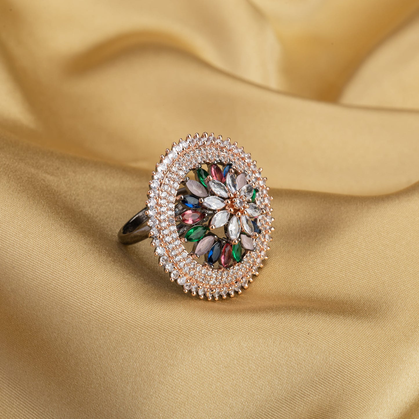 A MULTICOLOR FINGER RING SHOWCASES A VIBRANT ARRAY OF HUES, ADDING A PLAYFUL AND EYE-CATCHING TOUCH TO ANY OUTFIT.