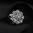 Silver floral zircon finger ring combines timeless beauty with sparkling brilliance.
