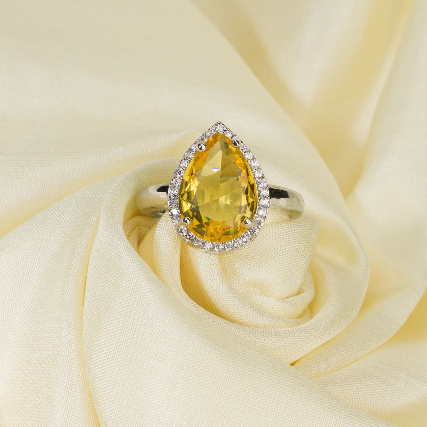 ZIRCON STONES STUDDED FINGER RING WITH YELLOW STONE