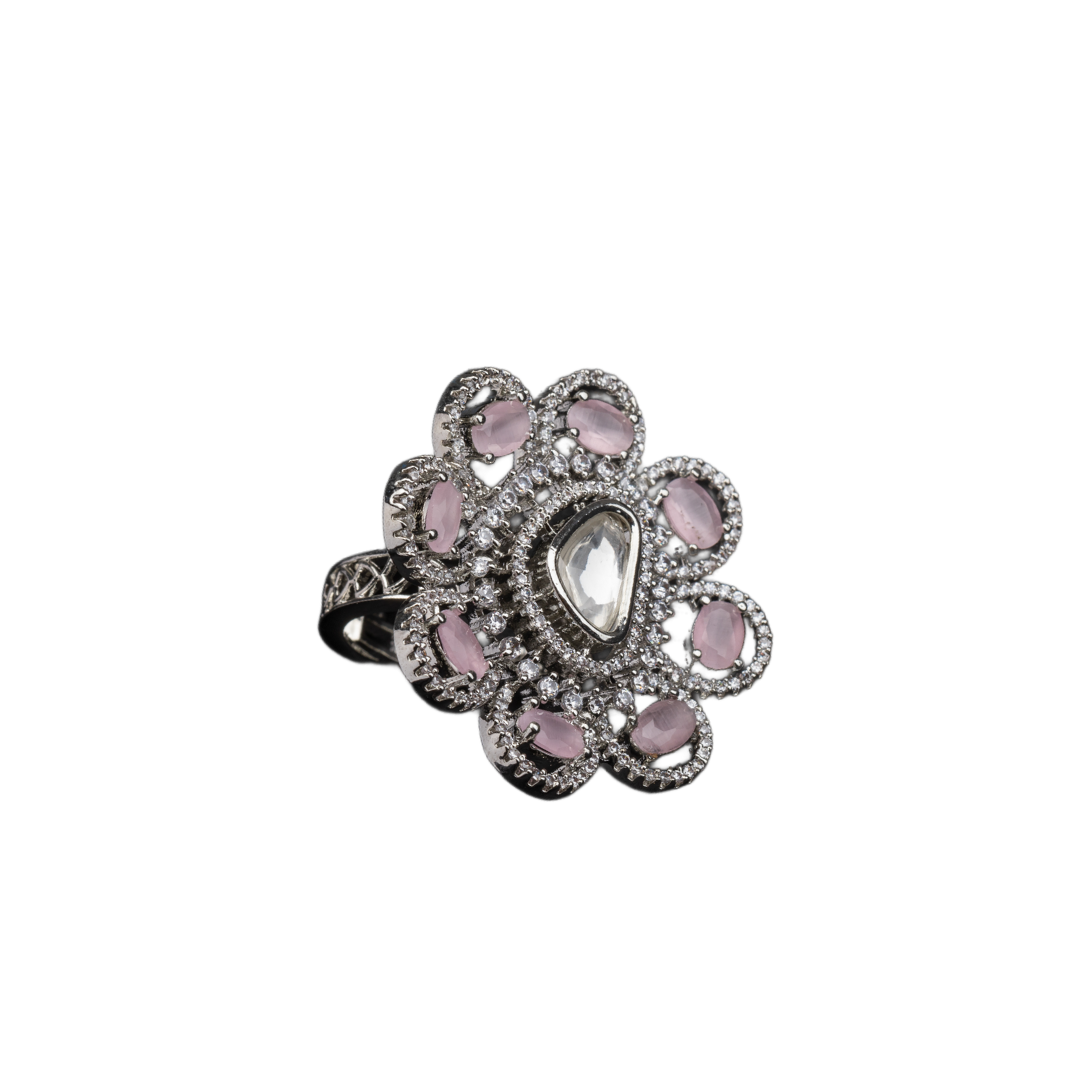 Floral zircon finger ring with orchid stones offers a graceful and elegant party look.
