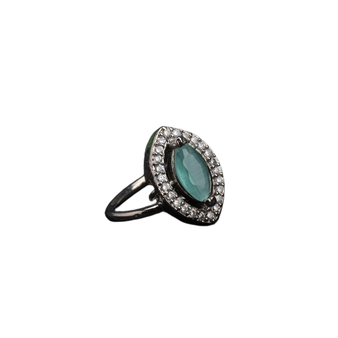 Zircon finger ring with turquoise stone adds a serene and chic sparkle for any occasion.
