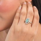 Zircon finger ring with turquoise stone adds a serene and chic sparkle for any occasion.
