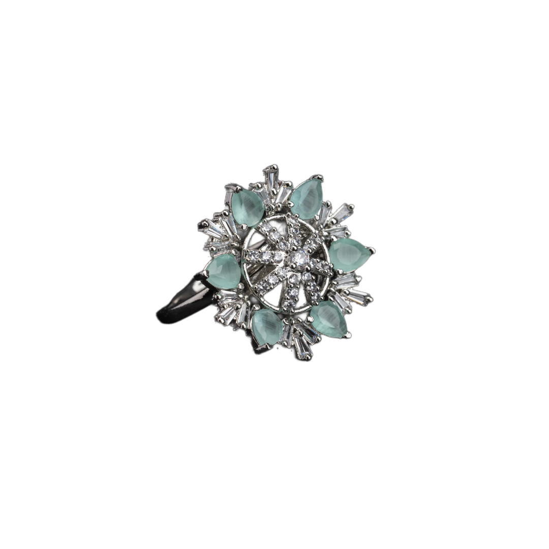 Aqua floral zircon finger ring adds a serene and vibrant charm to your party look.
