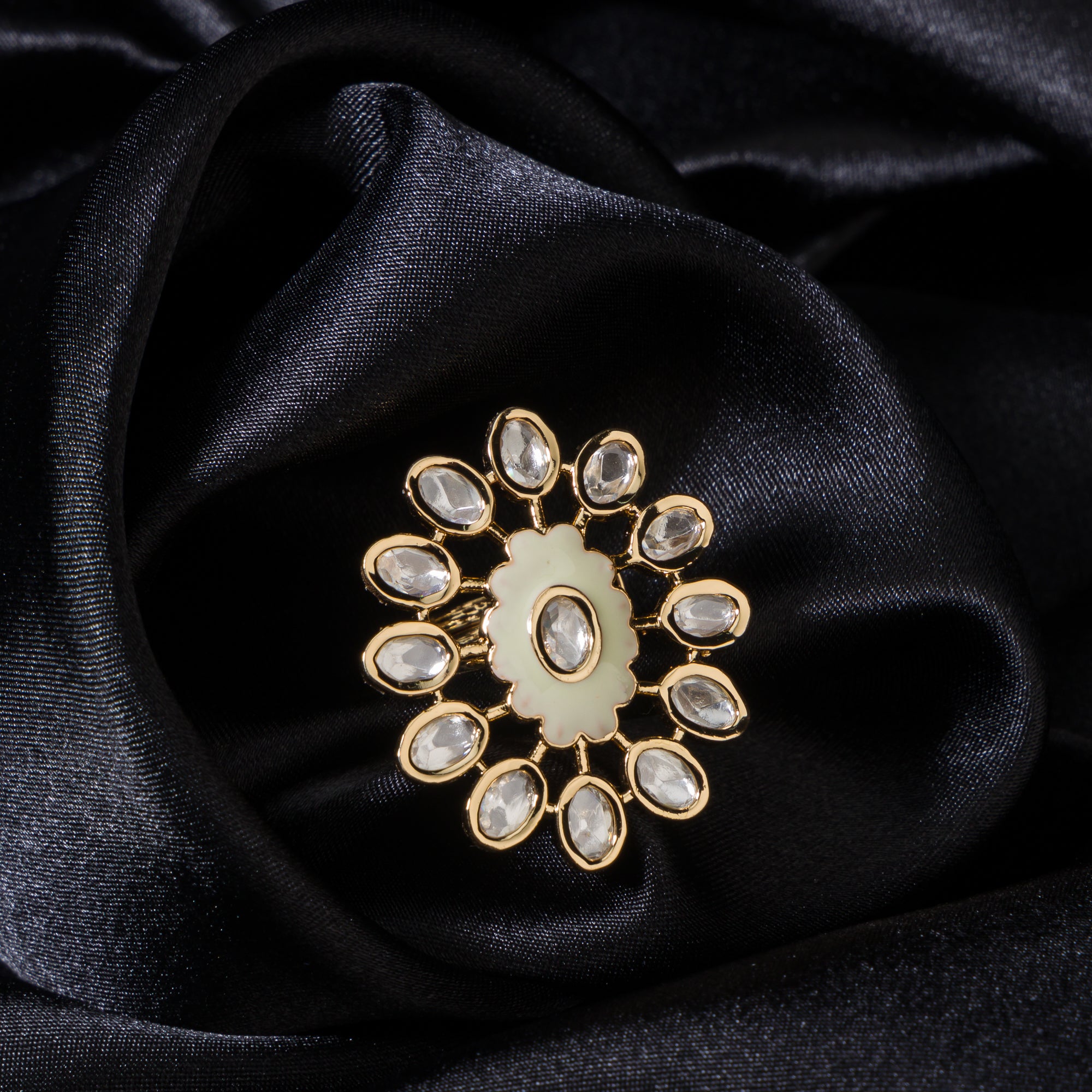 Golden zircon finger ring adds a touch of timeless elegance with its sparkling brilliance.
