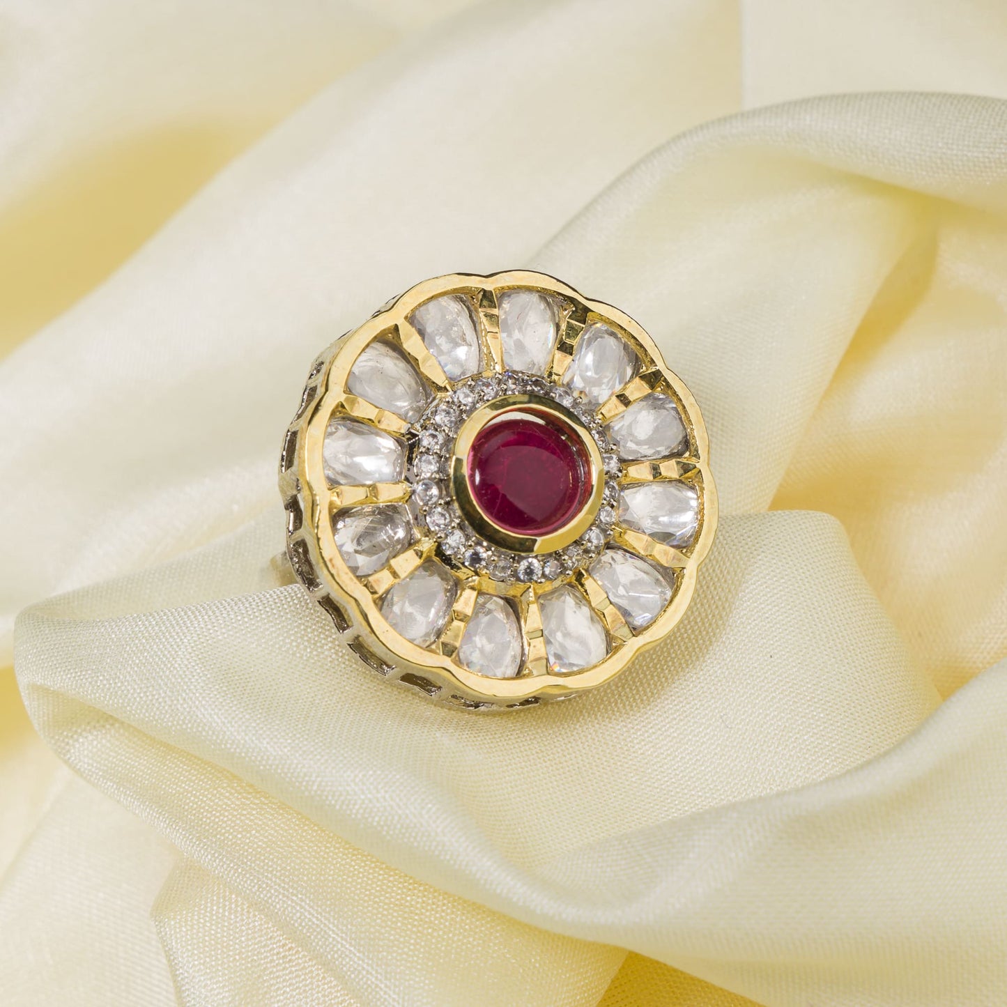 ADORN YOUR FINGERS WITH THIS EXQUISITE FLORAL DESIGN RING, STUDDED WITH SPARKLING ZIRCON STONESC