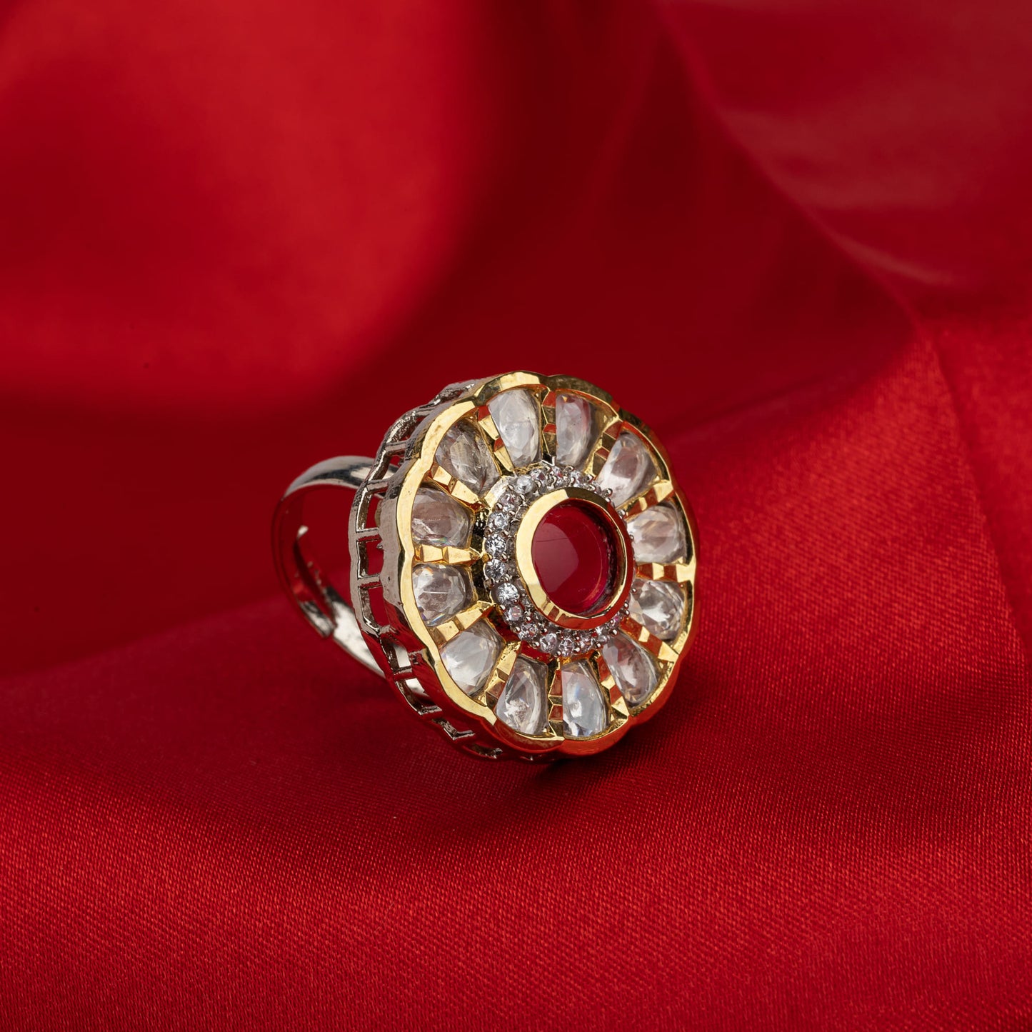 ADORN YOUR FINGERS WITH THIS EXQUISITE FLORAL DESIGN RING, STUDDED WITH SPARKLING ZIRCON STONESC