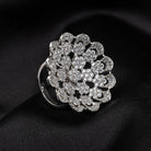 Silver zircon floral ring offers a blend of timeless charm and sparkling beauty, perfect for parties.
