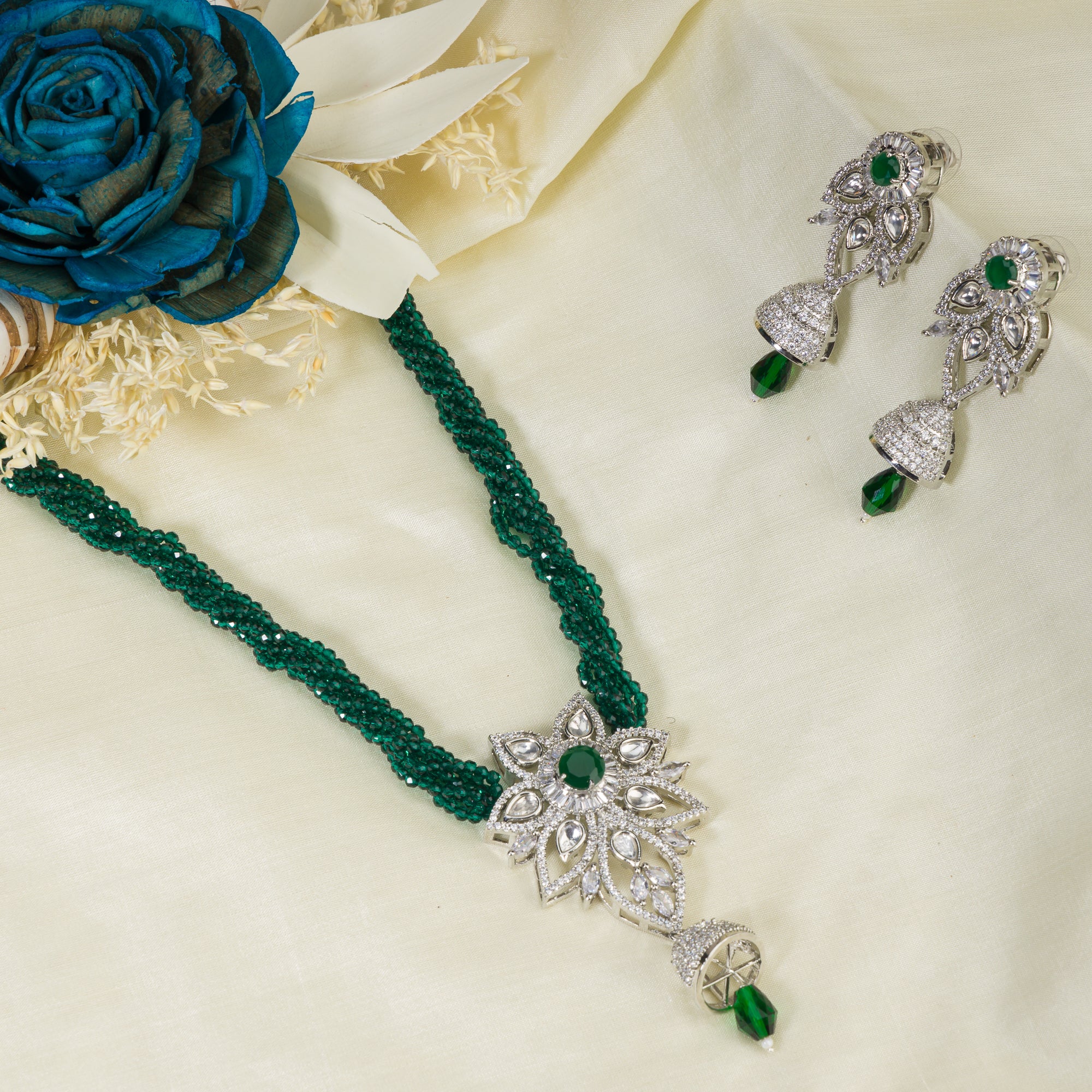 Green zircon long necklace set for a festive, refined look.
