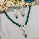 Green zircon long necklace set for a festive, refined look.
