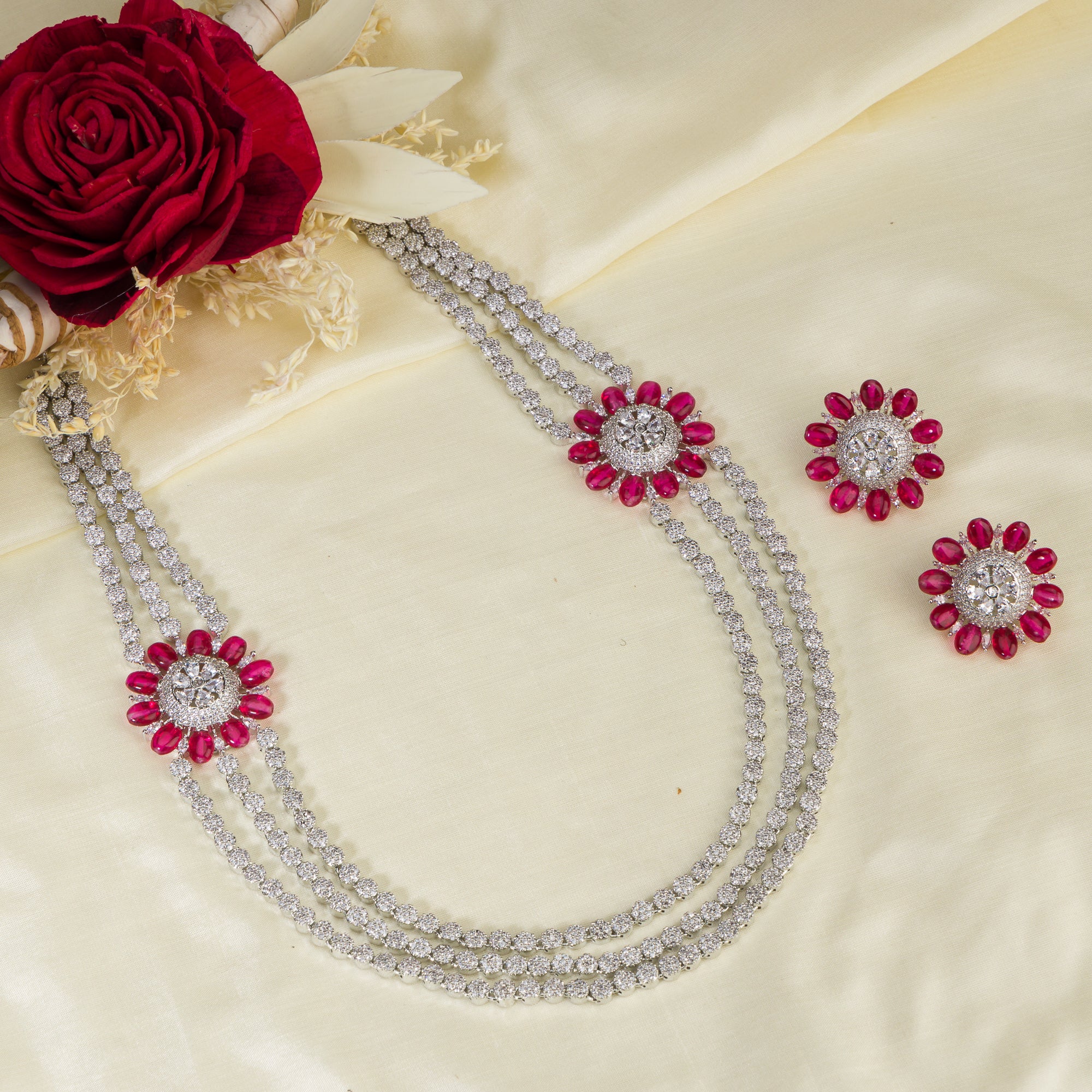 Three-layer silver zircon long necklace with flower design for an elegant sparkle.
