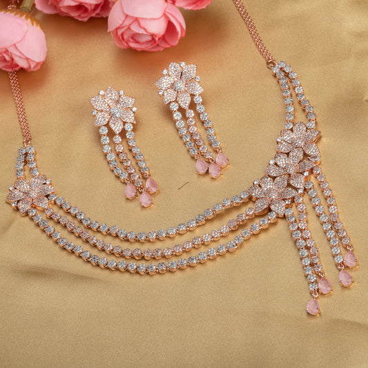 THIS EXQUISITE ORCHID-COLORED STONE-STUDDED ZIRCON NECKLACE SET WITH ROSE GOLD POLISH RADIATES ELEGANCE AND CHARM.