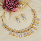 Golden polish zircon necklace set with matching earrings for a luxurious, elegant look.
