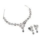 Sleek and elegant white zircon-studded necklace set for a refined party look.
