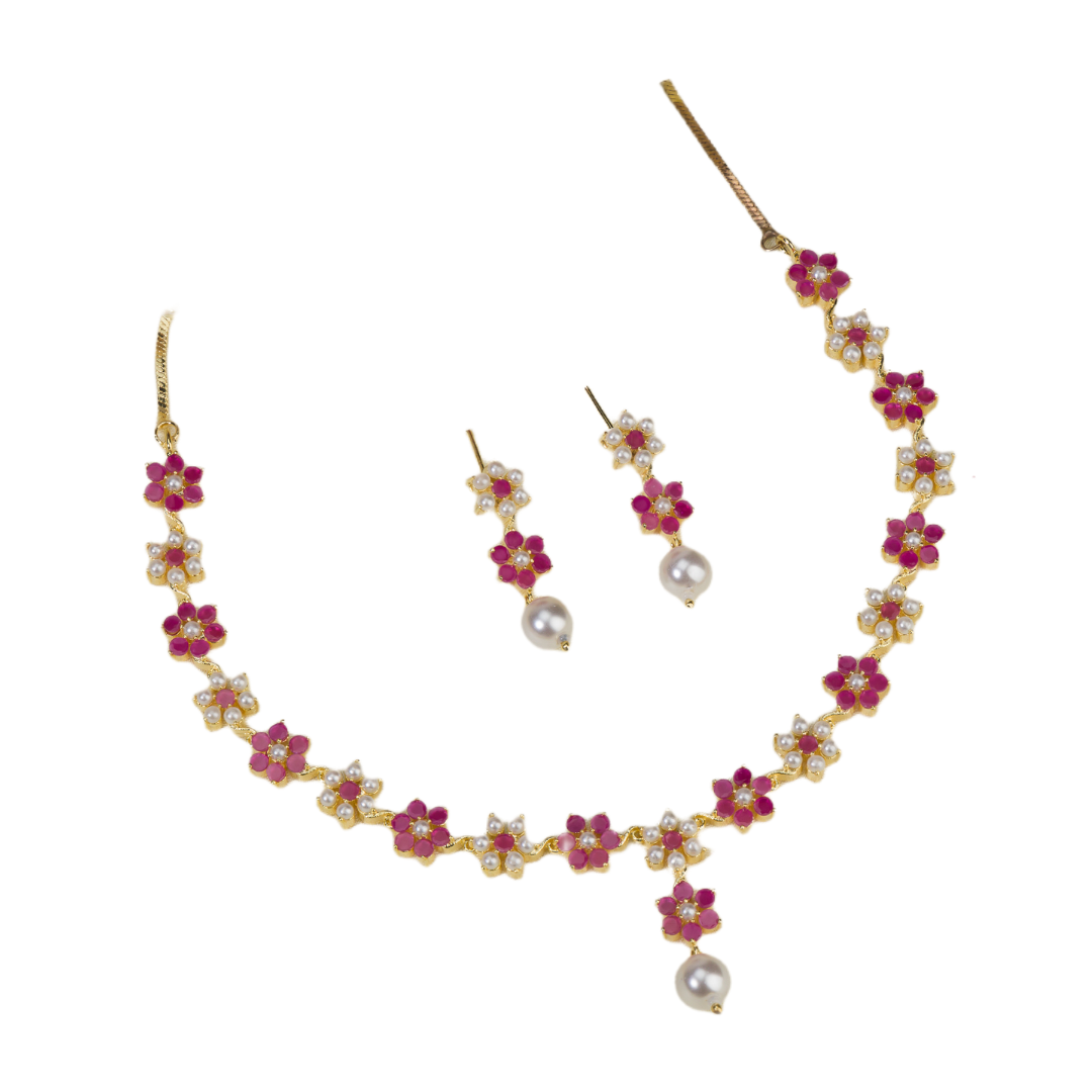 Pink pearl floral necklace set with matching earrings for timeless elegance and beauty.
