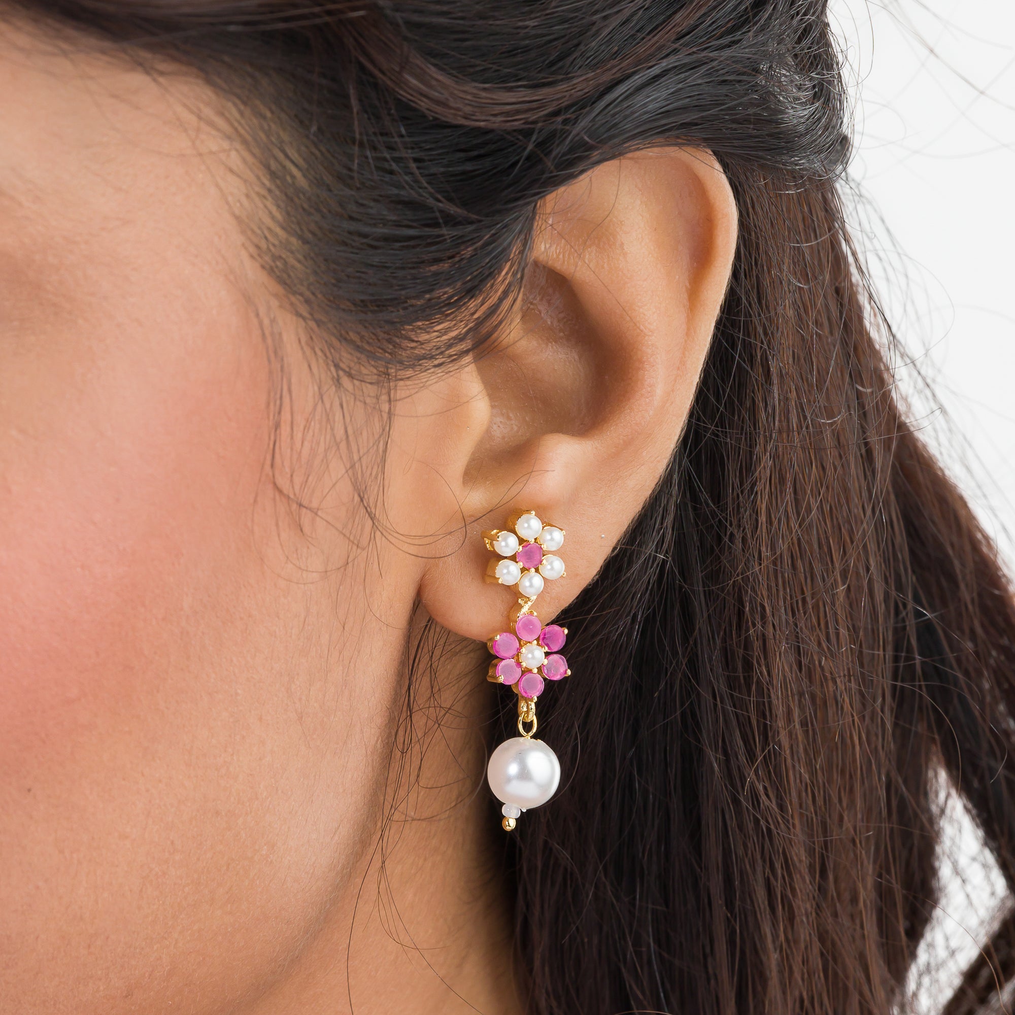 Pink pearl floral necklace set with matching earrings for timeless elegance and beauty.
