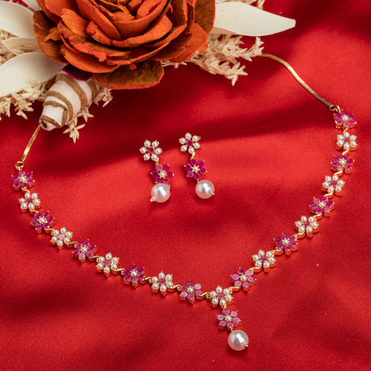 FLORAL DESIGN PEARL NECKLACE SET WITH MATCHING BEAUTIFUL EARRINGS, OFFERING TIMELESS ELEGANCE.